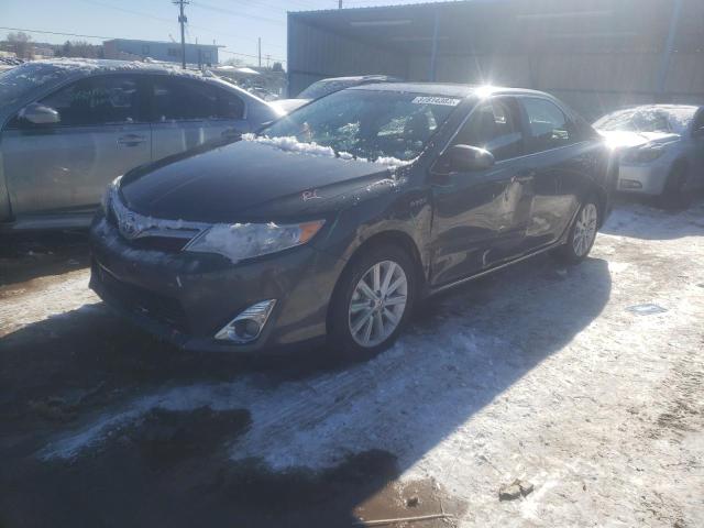 TOYOTA CAMRY HYBR 2012 with VIN 4T1BD1FK9CU057074 - Photo from auction