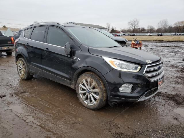 Photo 4 from auction – 2017 FORD ESCAPE TIT with VIN 1FMCU9JD5HUC64418