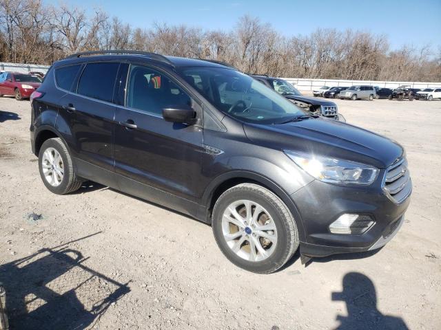 Photo 4 from auction – 2018 FORD ESCAPE SE with VIN 1FMCU0GD1JUC87476