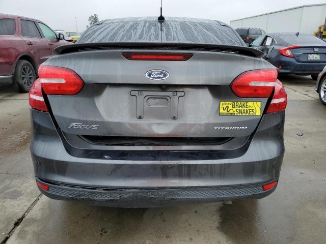Photo 6 from auction – 2015 FORD FOCUS TITA with VIN 1FADP3J23FL369379