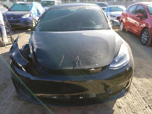 Photo 5 from auction – 2023 TESLA MODEL 3 with VIN 5YJ3E1EA4PF395284
