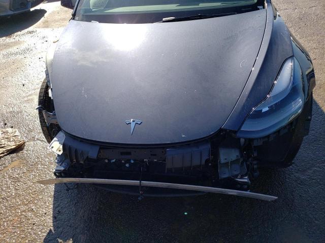 Photo 11 from auction – 2022 TESLA MODEL 3 with VIN 5YJ3E1EA1NF288688