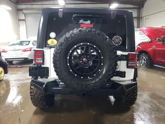 Photo 6 from auction – 2015 JEEP WRANGLER S with VIN 1C4AJWAGXFL752098