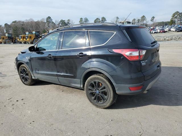 Photo 2 from auction – 2018 FORD ESCAPE SE with VIN 1FMCU9GD6JUB62249