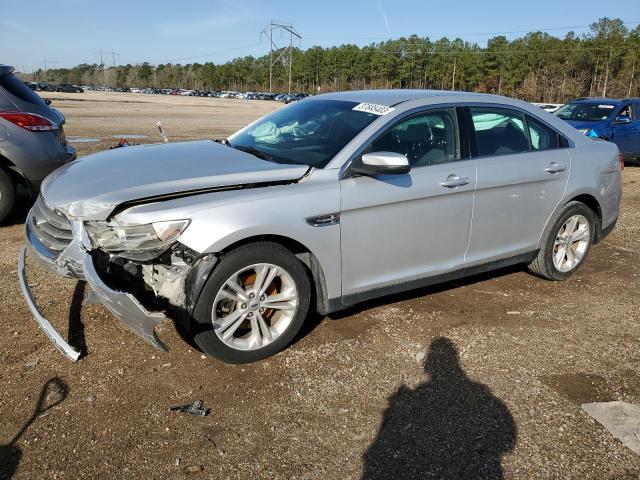 FORD TAURUS SEL 2014 with VIN 1FAHP2E8XEG170170 - Photo from auction