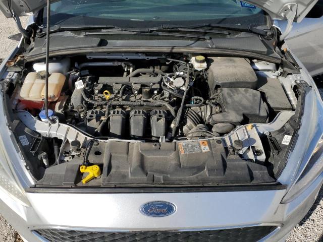 Photo 11 from auction – 2018 FORD FOCUS S with VIN 1FADP3E2XJL286714