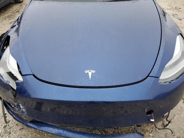 Photo 11 from auction – 2022 TESLA MODEL Y with VIN 7SAYGDEF2NF452787