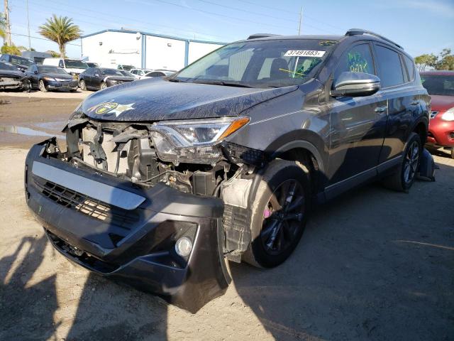 TOYOTA RAV4 LIMIT 2018 with VIN JTMYFREV3JJ734024 - Photo from auction