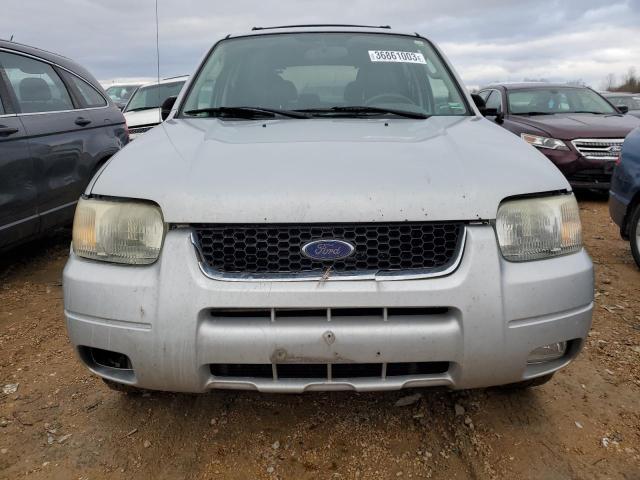 Photo 5 from auction – 2003 FORD ESCAPE LIM with VIN 1FMCU04143KC97900