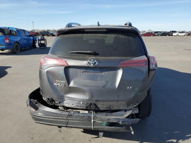 Photo 6 from auction – 2018 TOYOTA RAV4 LE with VIN JTMZFREV0JJ752694