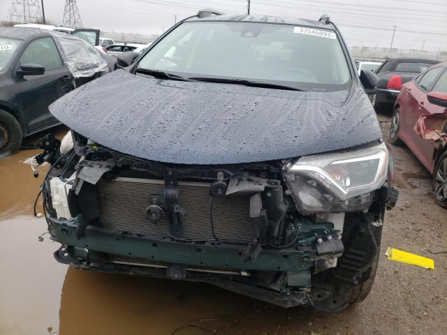 Photo 5 from auction – 2017 TOYOTA RAV4 LE with VIN JTMZFREV5HJ130473
