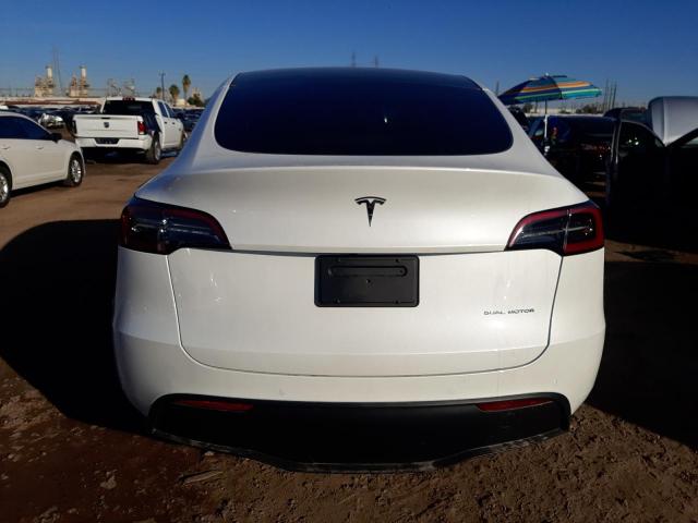 Photo 6 from auction – 2022 TESLA MODEL Y with VIN 7SAYGAEE6NF552882