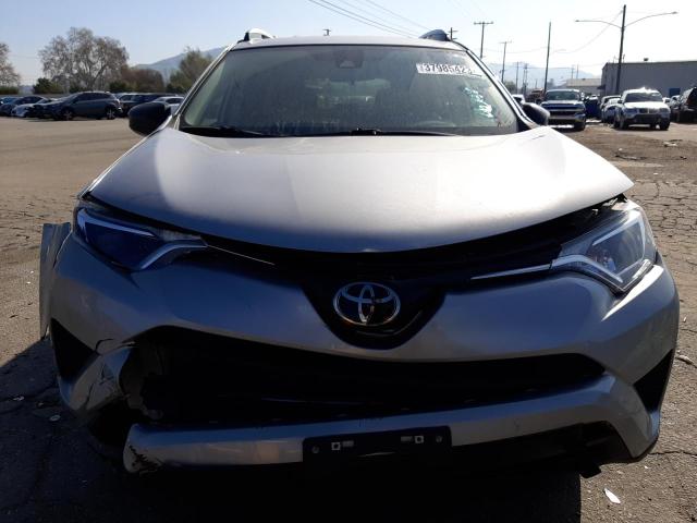 Photo 5 from auction – 2018 TOYOTA RAV4 LE with VIN 2T3ZFREV3JW441603