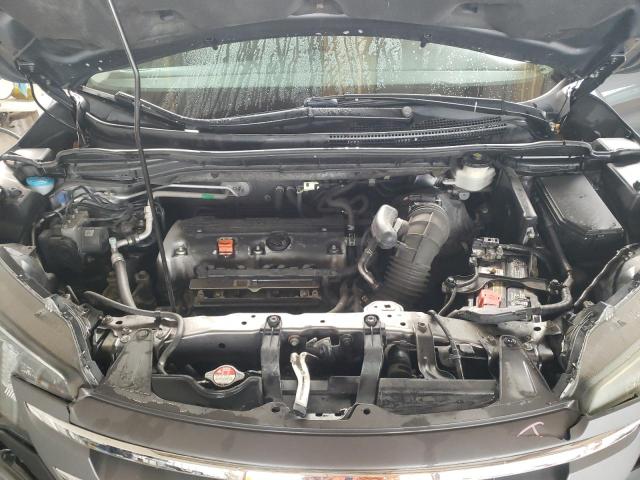 Photo 12 from auction – 2014 HONDA CR-V LX with VIN 3CZRM3H38EG711809