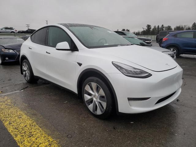 Photo 4 from auction – 2023 TESLA MODEL Y with VIN 7SAYGDEE1PA042456