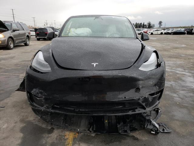 Photo 5 from auction – 2022 TESLA MODEL Y with VIN 7SAYGDEF8NF487818