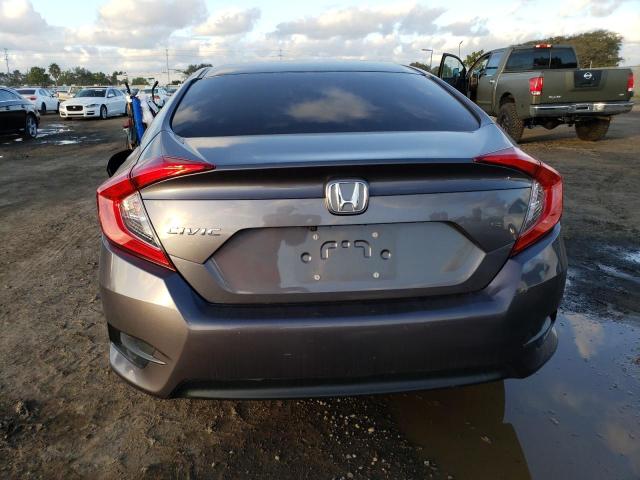 Photo 6 from auction – 2018 HONDA CIVIC LX with VIN 2HGFC2E54JH563391