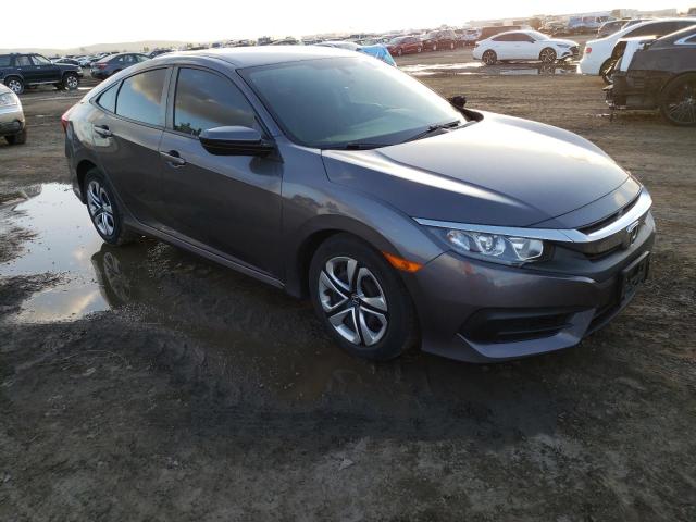 Photo 4 from auction – 2018 HONDA CIVIC LX with VIN 2HGFC2E54JH563391