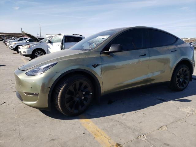 TESLA MODEL Y 2023 with VIN 7SAYGDEE1PA023910 - Photo from auction