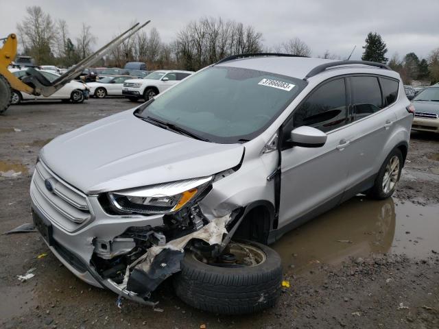 FORD ESCAPE SE 2018 with VIN 1FMCU9GD6JUC61153 - Photo from auction