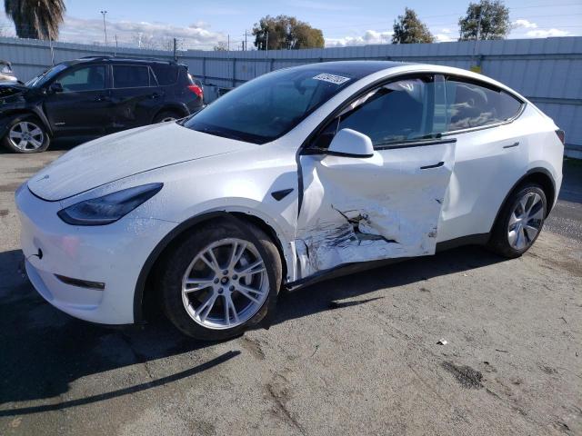 TESLA MODEL Y 2022 with VIN 7SAYGDEE8NF431272 - Photo from auction