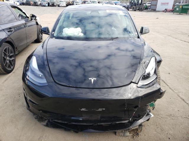 Photo 5 from auction – 2022 TESLA MODEL 3 with VIN 5YJ3E1EB8NF305172