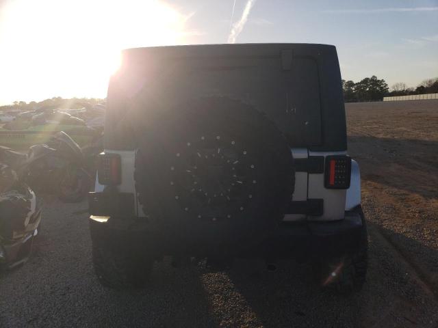 Photo 6 from auction – 2012 JEEP WRANGLER U with VIN 1C4BJWDG6CL214946