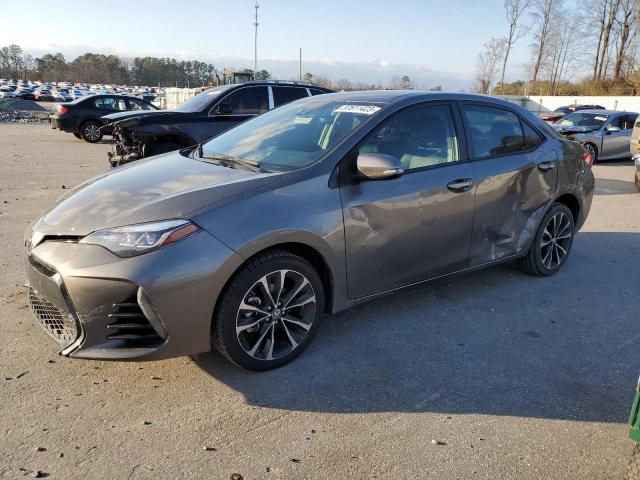 TOYOTA COROLLA L 2017 with VIN 2T1BURHE4HC822822 - Photo from auction
