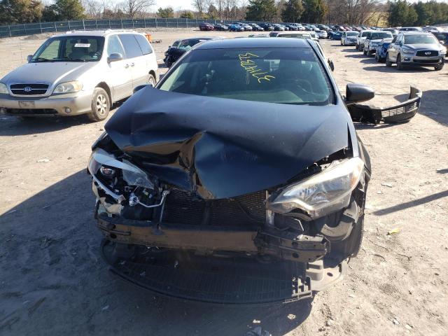 Photo 5 from auction – 2014 TOYOTA COROLLA L with VIN 2T1BURHE3EC046601