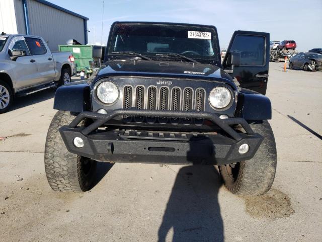 Photo 5 from auction – 2016 JEEP WRANGLER U with VIN 1C4BJWEG9GL279200
