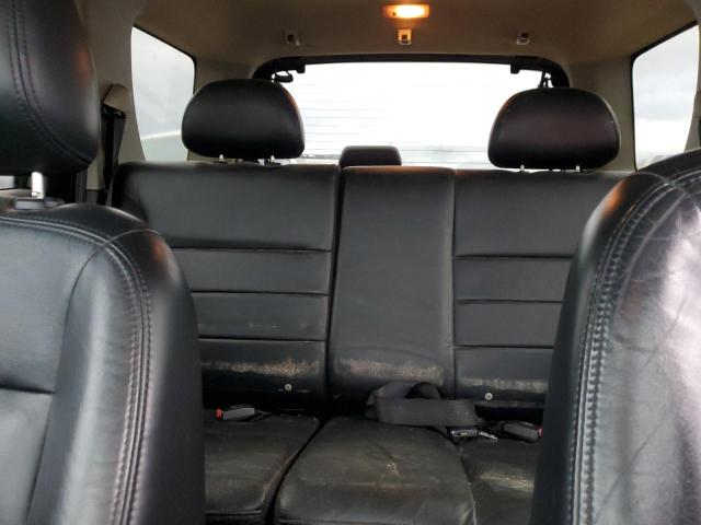 Photo 10 from auction – 2003 FORD ESCAPE LIM with VIN 1FMCU04143KC97900