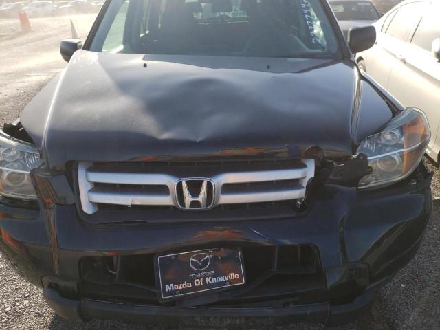 Photo 12 from auction – 2006 HONDA PILOT LX with VIN 5FNYF28126B049107