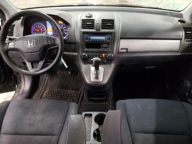 Photo 8 from auction – 2011 HONDA CR-V LX with VIN 5J6RE4H33BL060929