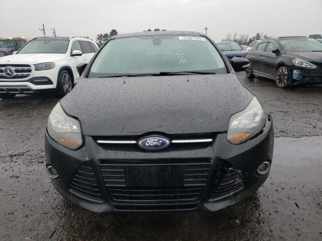Photo 5 from auction – 2012 FORD FOCUS TITA with VIN 1FAHP3J24CL480178