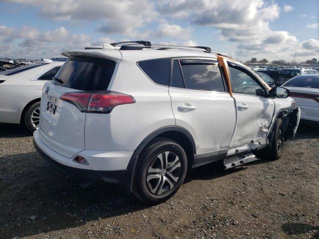 Photo 3 from auction – 2018 TOYOTA RAV4 LE with VIN 2T3ZFREV9JW460429