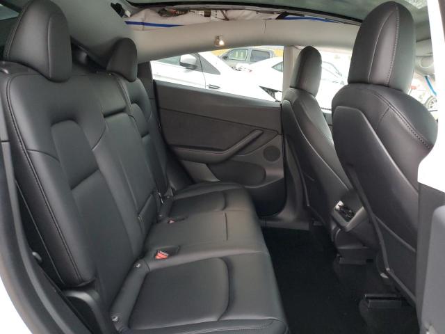 Photo 11 from auction – 2021 TESLA MODEL Y with VIN 5YJYGDEE0MF099968