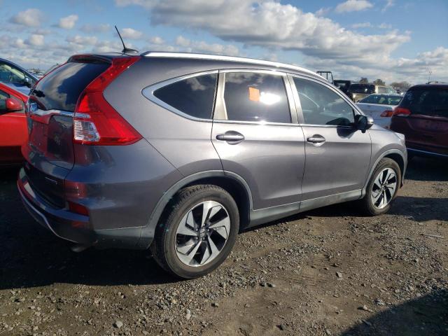 Photo 3 from auction – 2016 HONDA CR-V TOURI with VIN 5J6RM3H91GL025377
