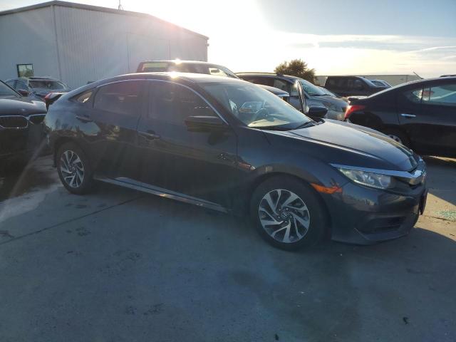 Photo 4 from auction – 2018 HONDA CIVIC EX with VIN 19XFC2F77JE204739