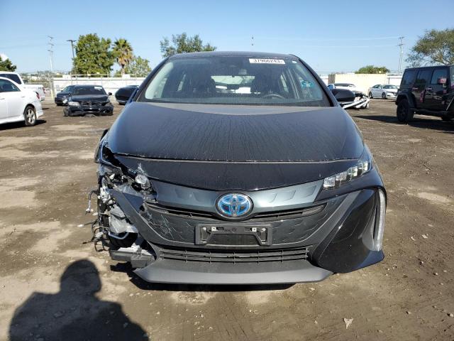Photo 5 from auction – 2021 TOYOTA PRIUS PRIM with VIN JTDKAMFP2M3174190