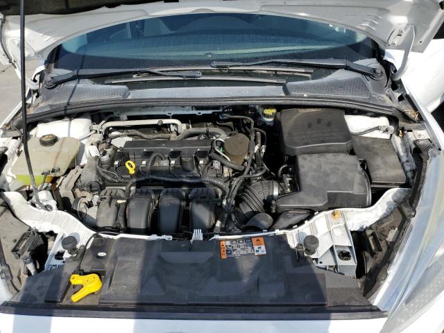 Photo 11 from auction – 2015 FORD FOCUS S with VIN 1FADP3E26FL335947
