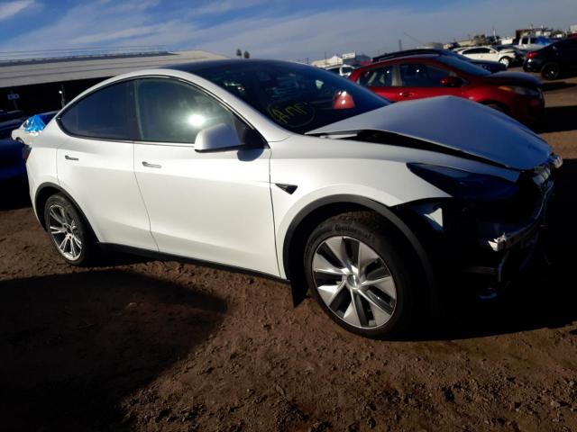 Photo 4 from auction – 2022 TESLA MODEL Y with VIN 7SAYGAEE6NF552882