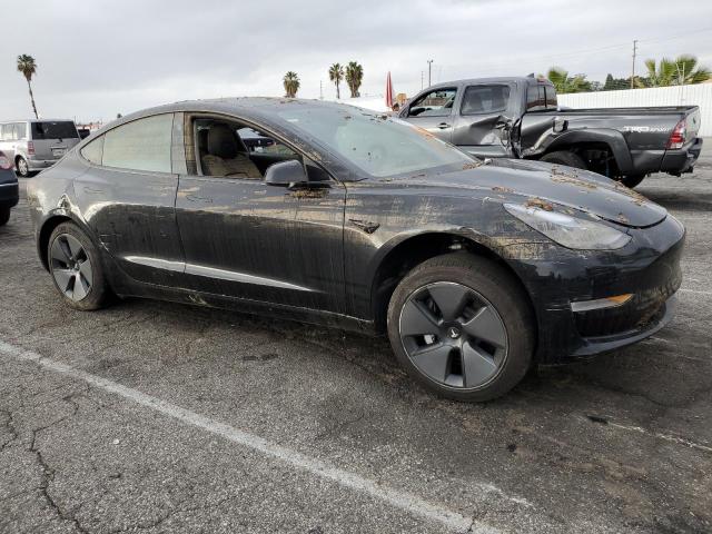 Photo 4 from auction – 2021 TESLA MODEL 3 with VIN 5YJ3E1EB1MF995278