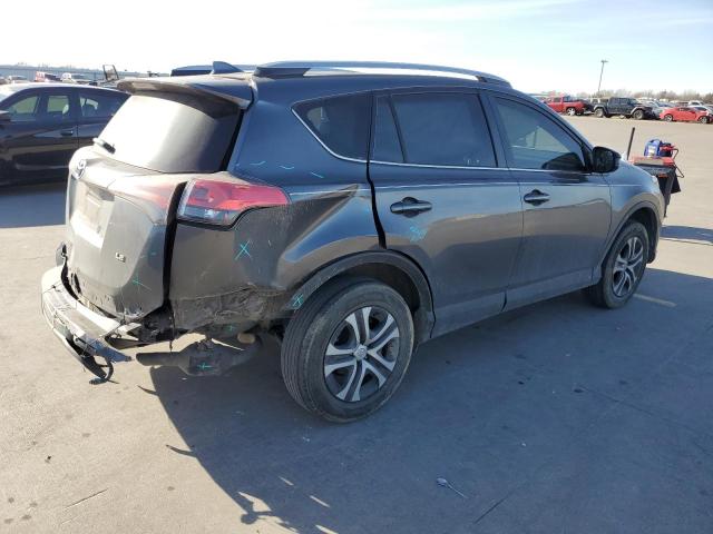 Photo 3 from auction – 2018 TOYOTA RAV4 LE with VIN JTMZFREV0JJ752694