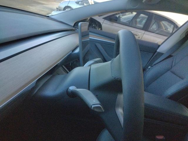 Photo 9 from auction – 2022 TESLA MODEL 3 with VIN 5YJ3E1EB9NF318576