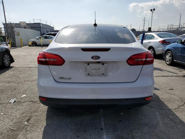Photo 6 from auction – 2015 FORD FOCUS S with VIN 1FADP3E26FL335947