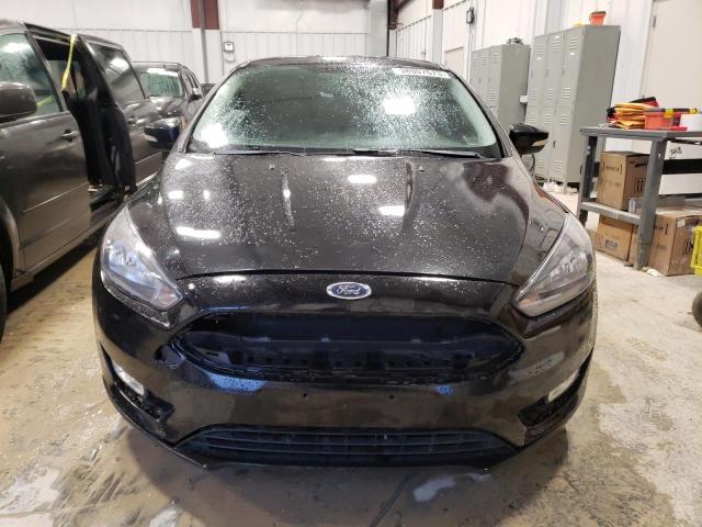 Photo 5 from auction – 2015 FORD FOCUS SE with VIN 1FADP3F22FL254491