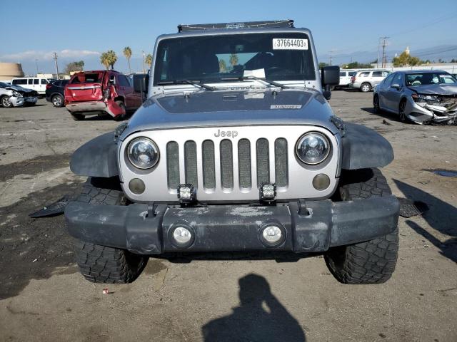 Photo 5 from auction – 2016 JEEP WRANGLER U with VIN 1C4BJWFG8GL291790