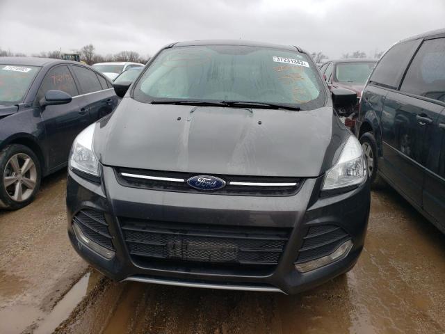 Photo 5 from auction – 2015 FORD ESCAPE with VIN 1FMCU0G77FUC75544