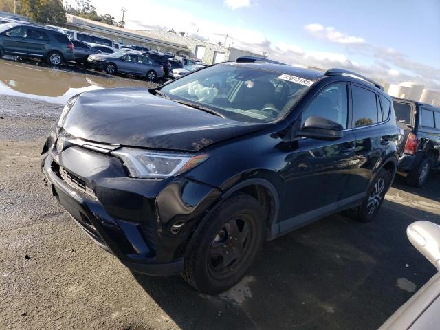 TOYOTA RAV4 LE 2018 with VIN 2T3ZFREV8JW462818 - Photo from auction