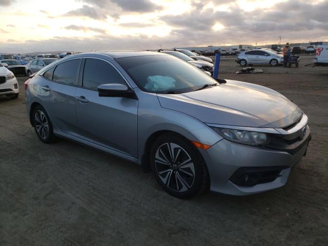 Photo 4 from auction – 2016 HONDA CIVIC EX with VIN 2HGFC1F32GH638170